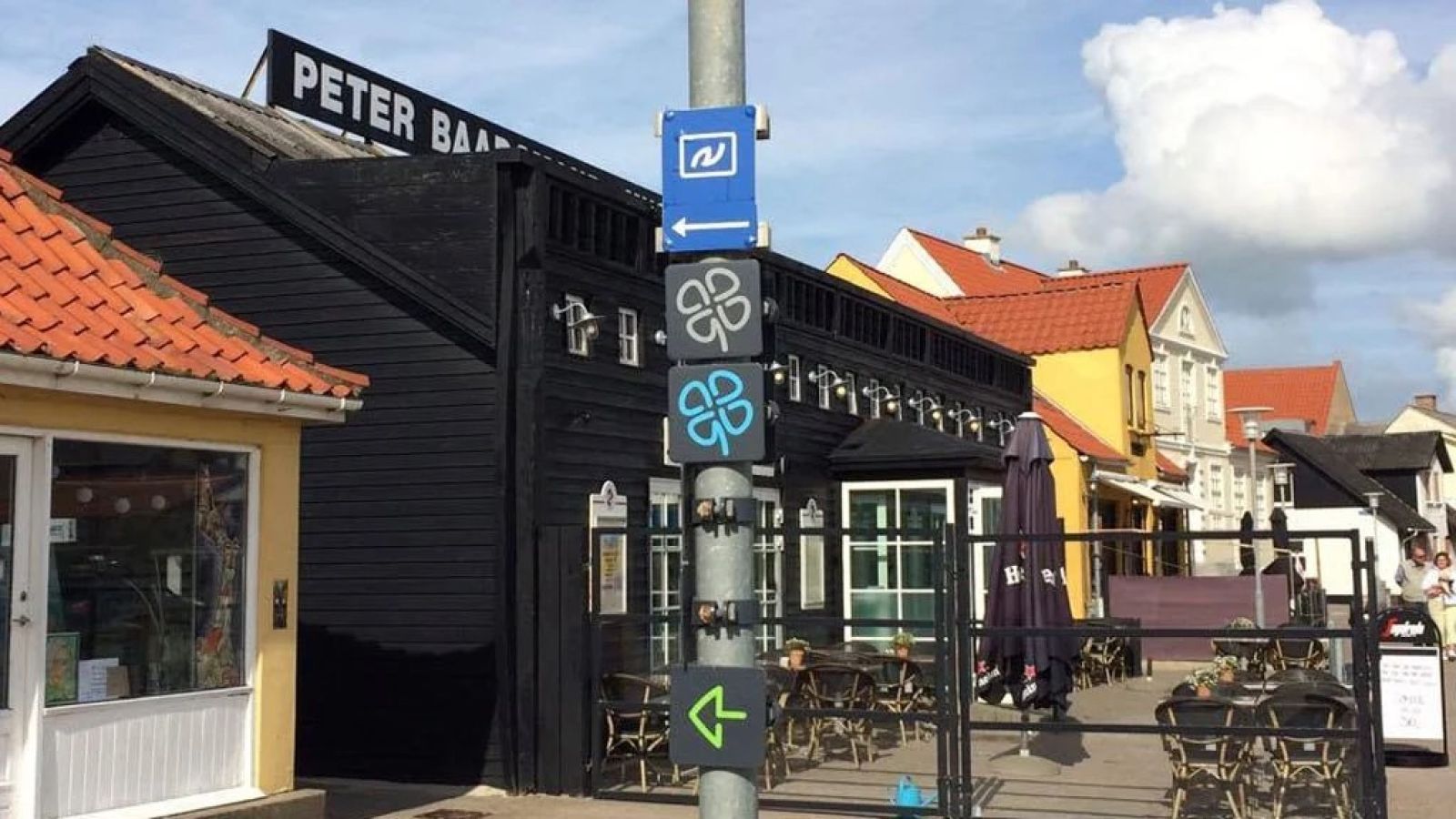 Piktogram, den blå kløver. 