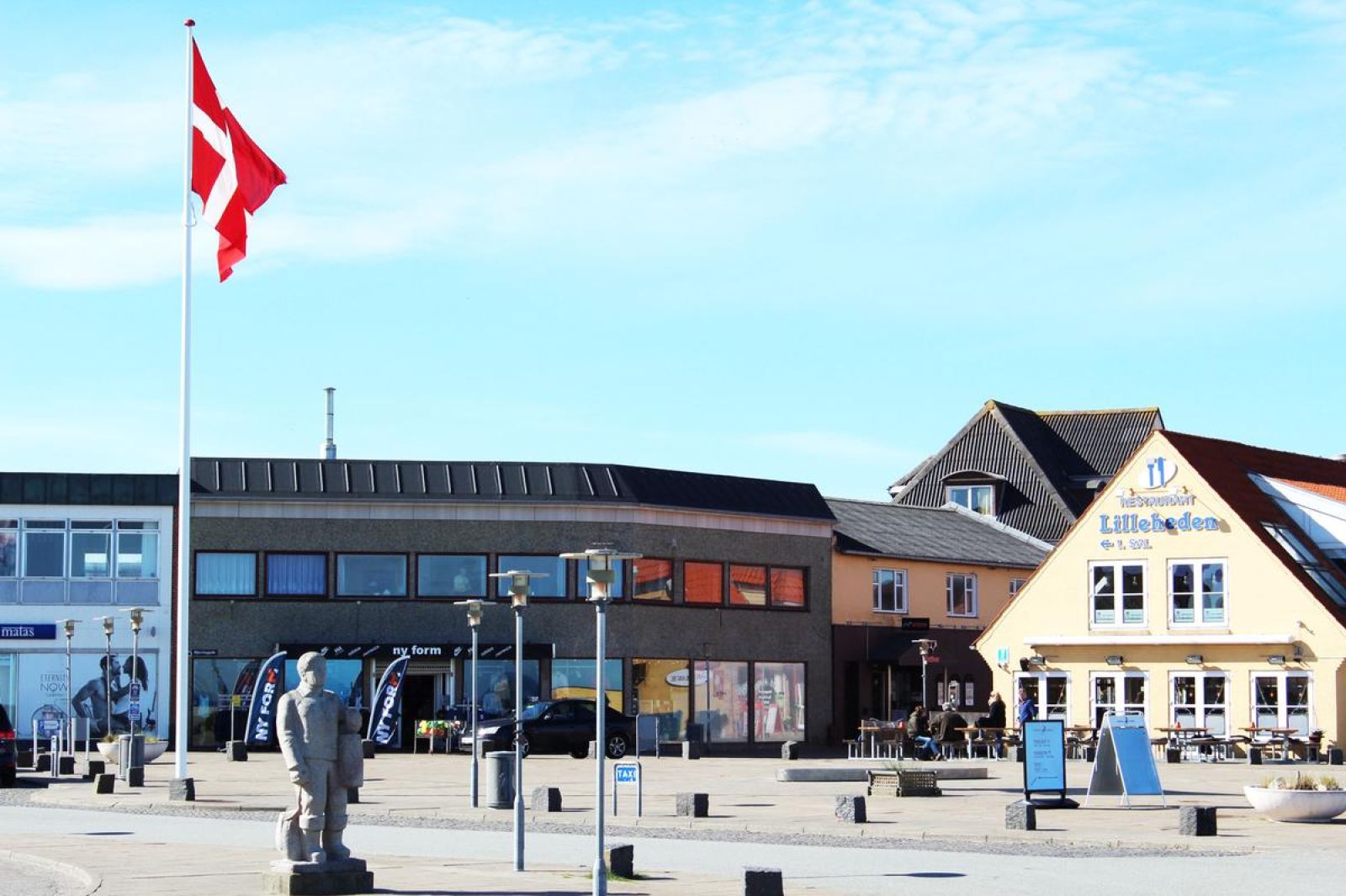 Den grønne plads som start og slutpunkt.