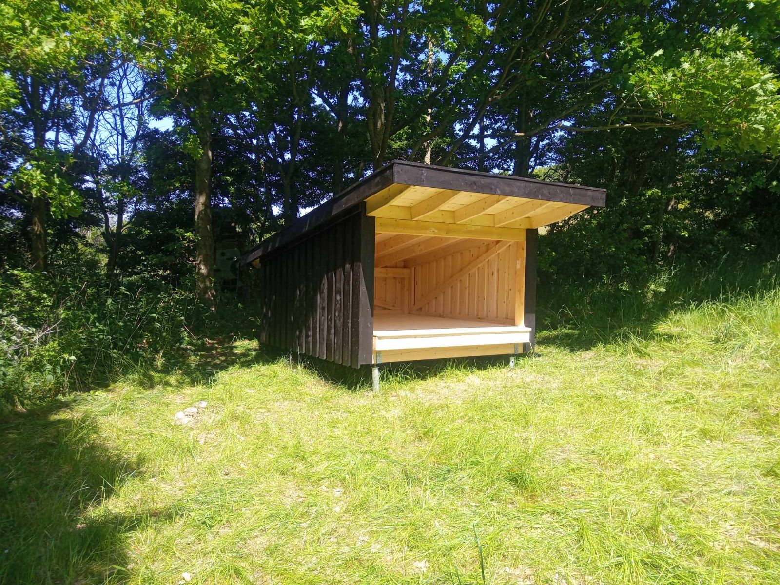 Shelter på skrånende terræn
